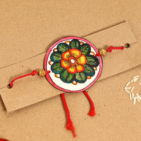  Handpainted Tholu Bommalata Leather Rakhi 
