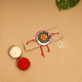  Handpainted Tholu Bommalata Leather Rakhi 