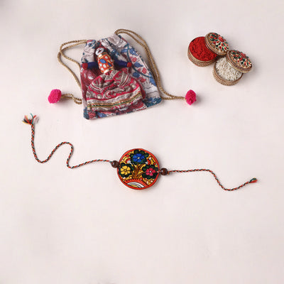 Flower - Handpainted Tholu Bommalata Leather Rakhi (Assorted) 30