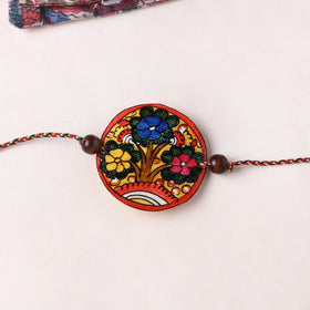 Flower - Handpainted Tholu Bommalata Leather Rakhi (Assorted) 30