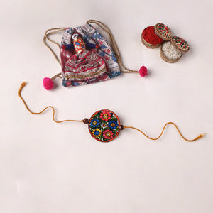 Flower - Reusable Handpainted Tholu Bommalata Leather Rakhi with Potli (Assorted) 33