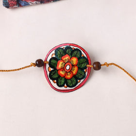 Flower - Handpainted Tholu Bommalata Leather Rakhi (Assorted) 35
