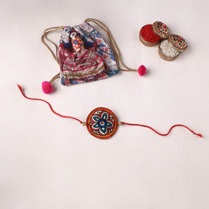Flower - Reusable Handpainted Tholu Bommalata Leather Rakhi with Potli (Assorted) 38