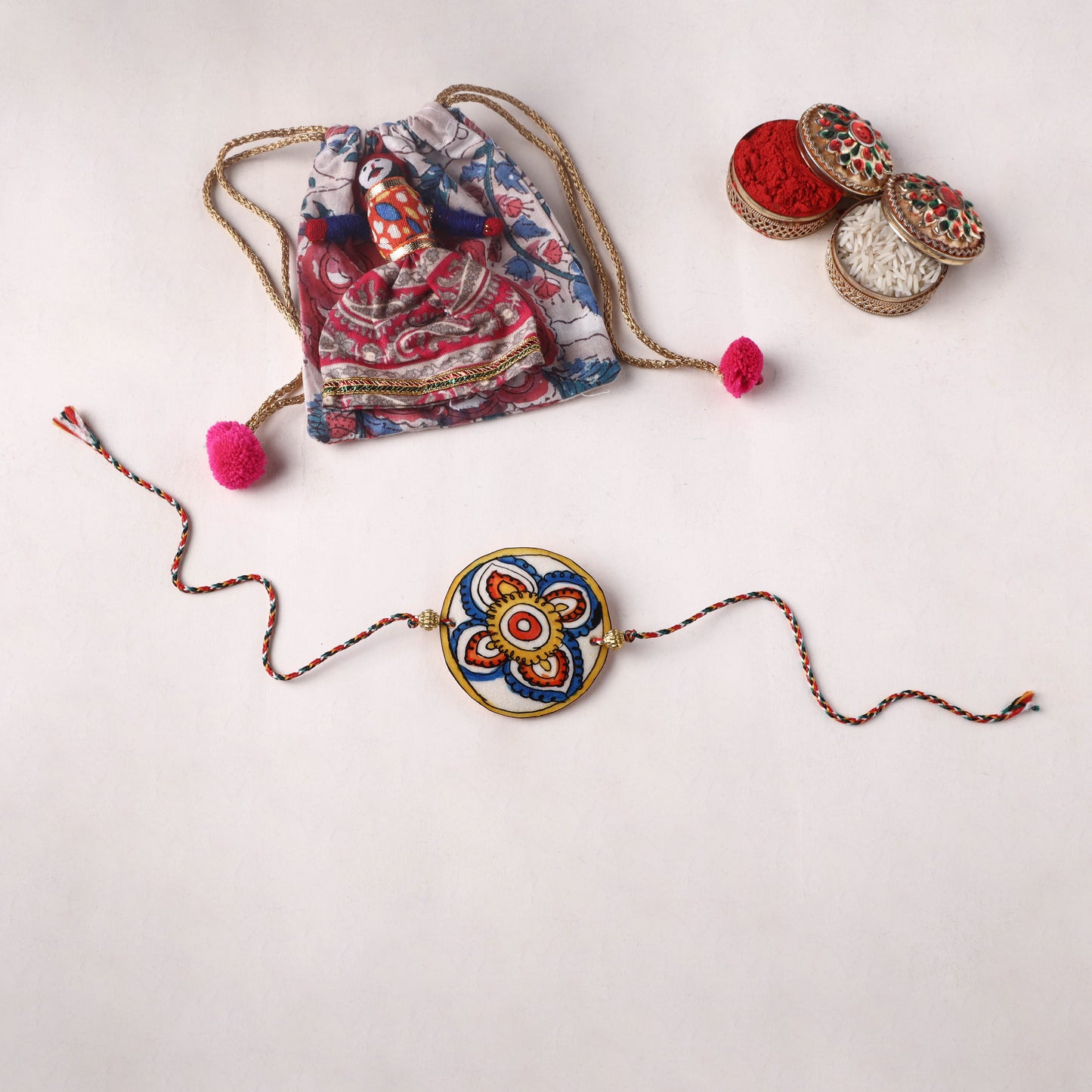 Flower - Handpainted Tholu Bommalata Leather Rakhi (Assorted) 40