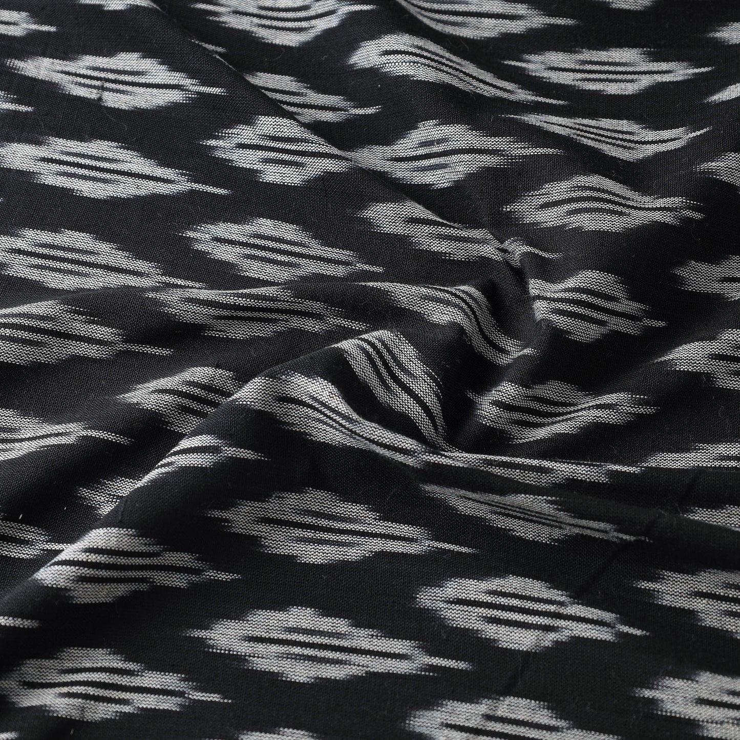 Greyish Leaflets Motifs On Black Pochampally Ikat Weave Pure Cotton Fabric