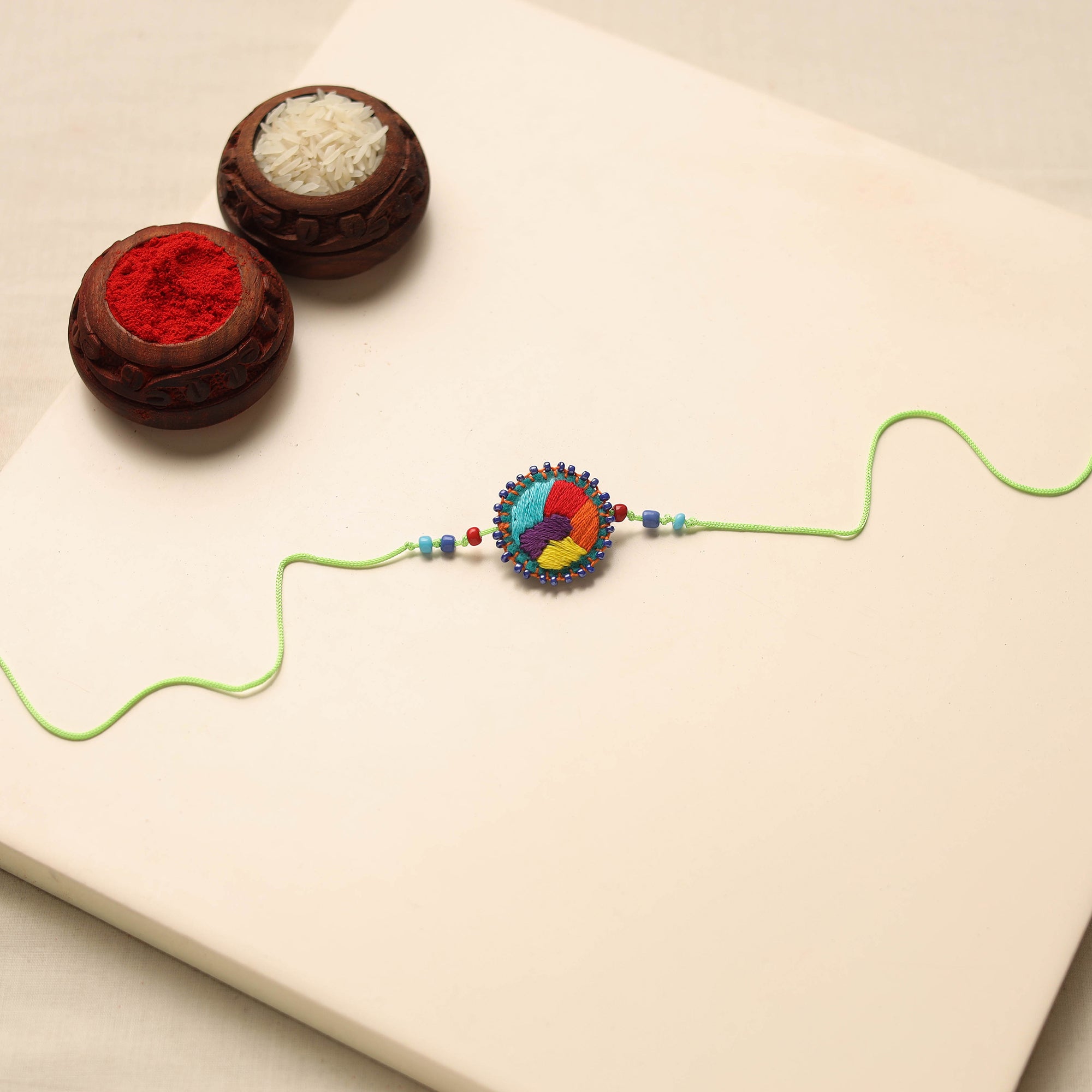 Hand Embroidered Beadwork Rakhi – iTokri आई.टोकरी