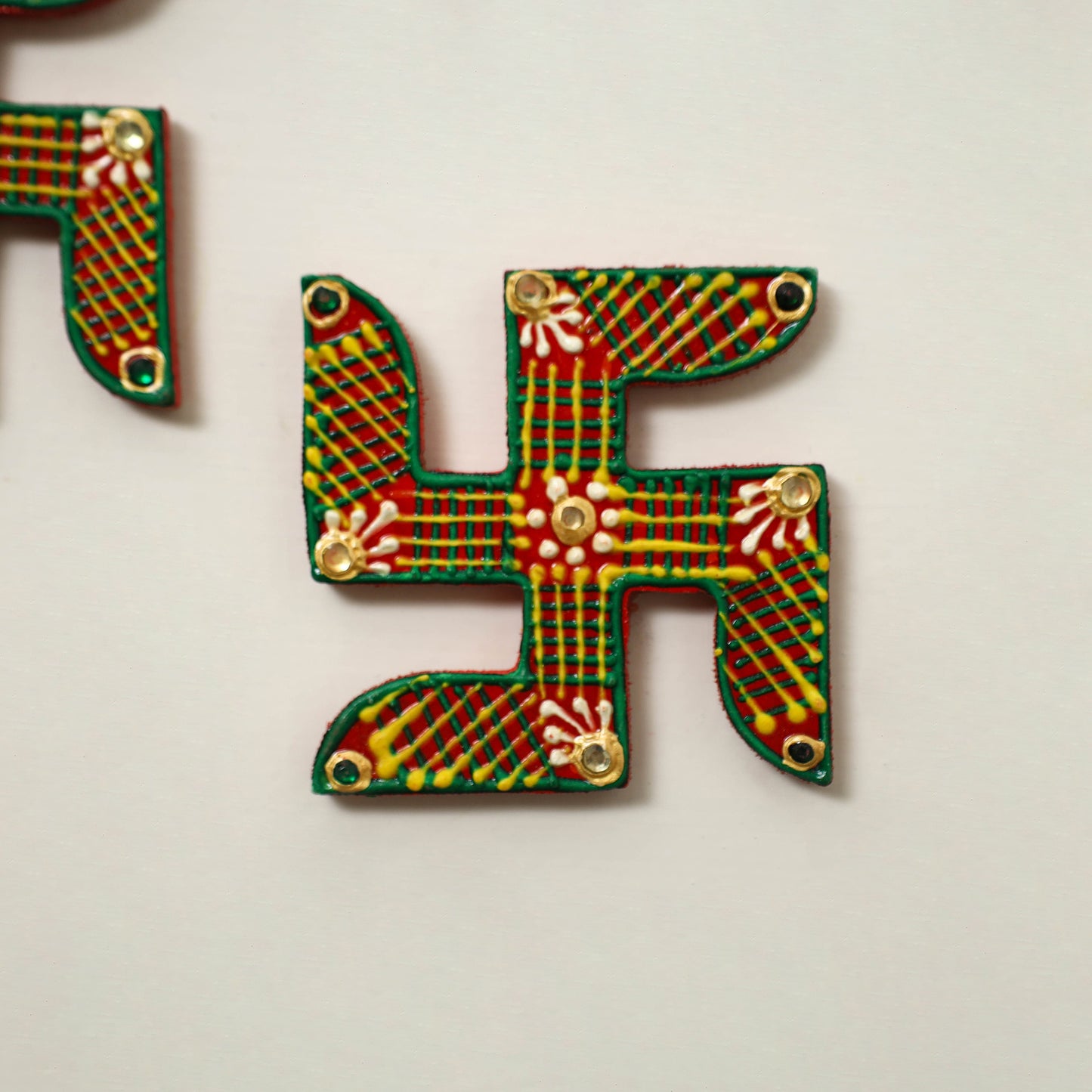 Traditional handpainted wooden swastik (pair) 21