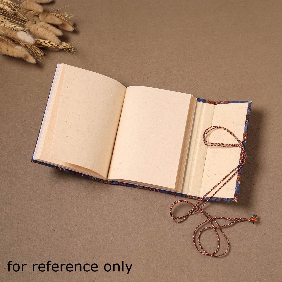 Handmade Paper Notebook in Ikat Cover with Thread Lock (7 x 5 in) 01