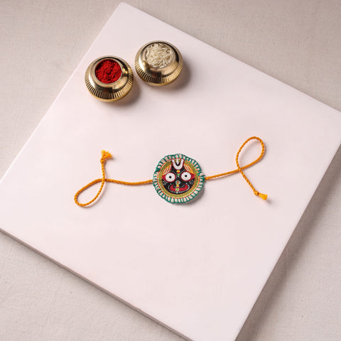 Lord Jagannath - Reusable Pattachitra Handpainted Rakhi with Potli 01