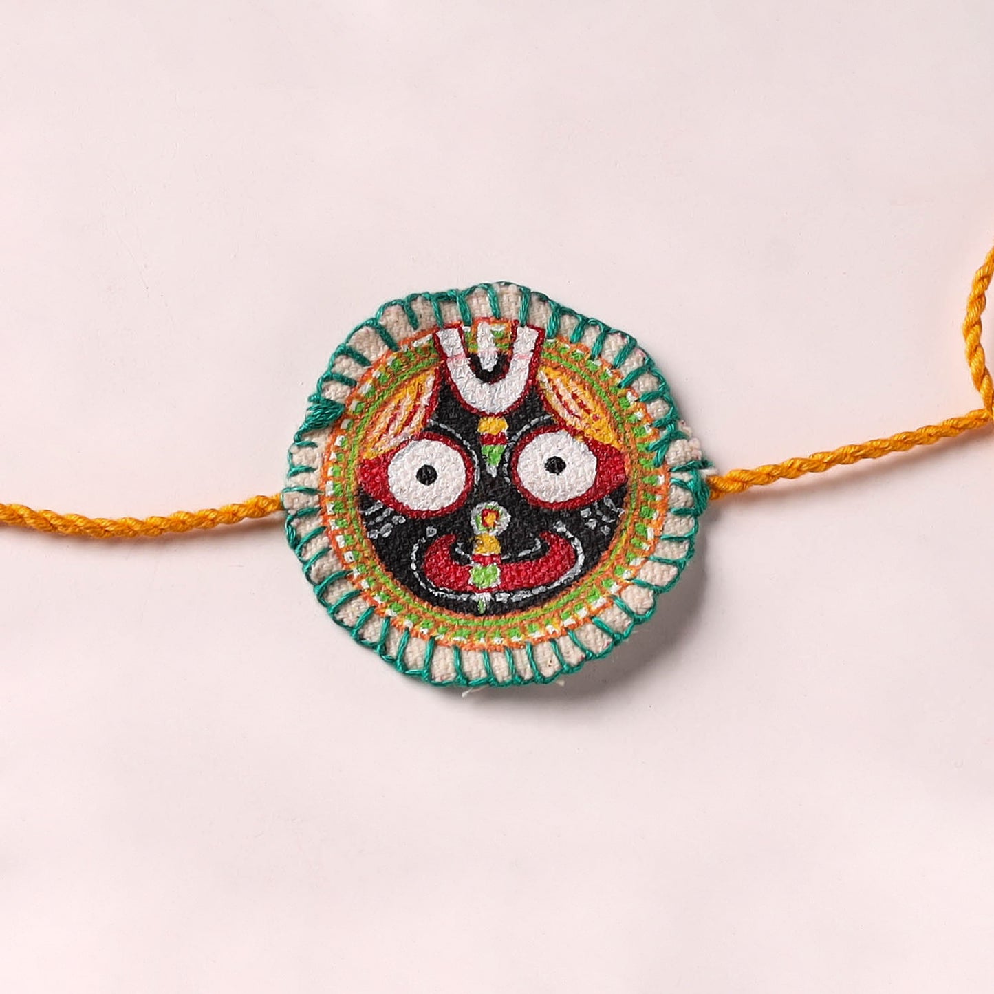 Lord Jagannath - Reusable Pattachitra Handpainted Rakhi with Potli 01