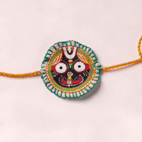 Lord Jagannath - Reusable Pattachitra Handpainted Rakhi with Potli 01
