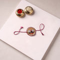 Lord Jagannath - Reusable Pattachitra Handpainted Rakhi with Potli 02