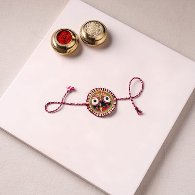 Lord Jagannath - Reusable Pattachitra Handpainted Rakhi with Potli 02