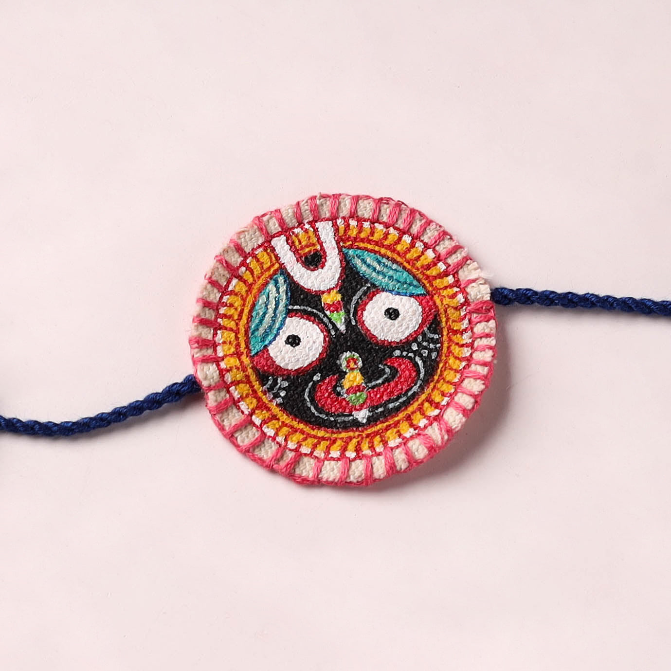 Lord Jagannath - Reusable Pattachitra Handpainted Rakhi with Potli 03