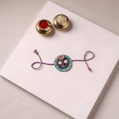 Lord Jagannath - Reusable Pattachitra Handpainted Rakhi with Potli 04