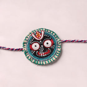 Lord Jagannath - Reusable Pattachitra Handpainted Rakhi with Potli 04