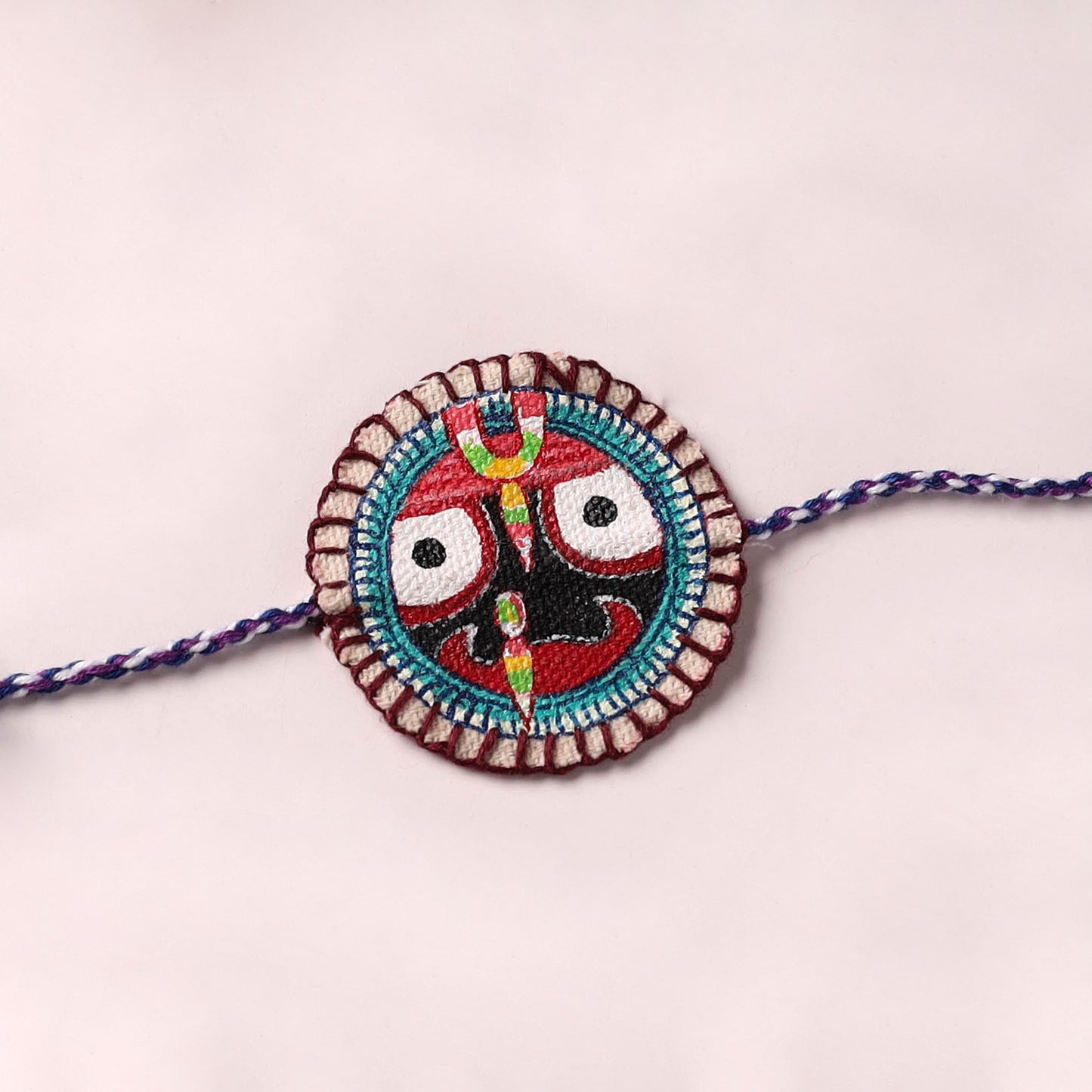 Lord Jagannath - Reusable Pattachitra Handpainted Rakhi with Potli 05