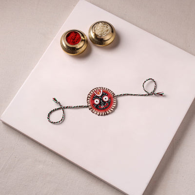 Lord Jagannath - Reusable Pattachitra Handpainted Rakhi with Potli 06