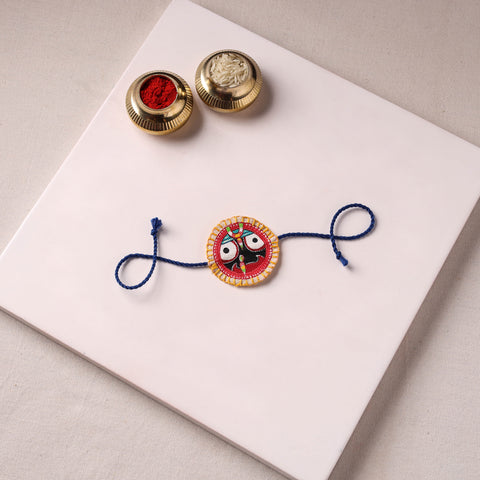 Lord Jagannath - Reusable Pattachitra Handpainted Rakhi with Potli 07