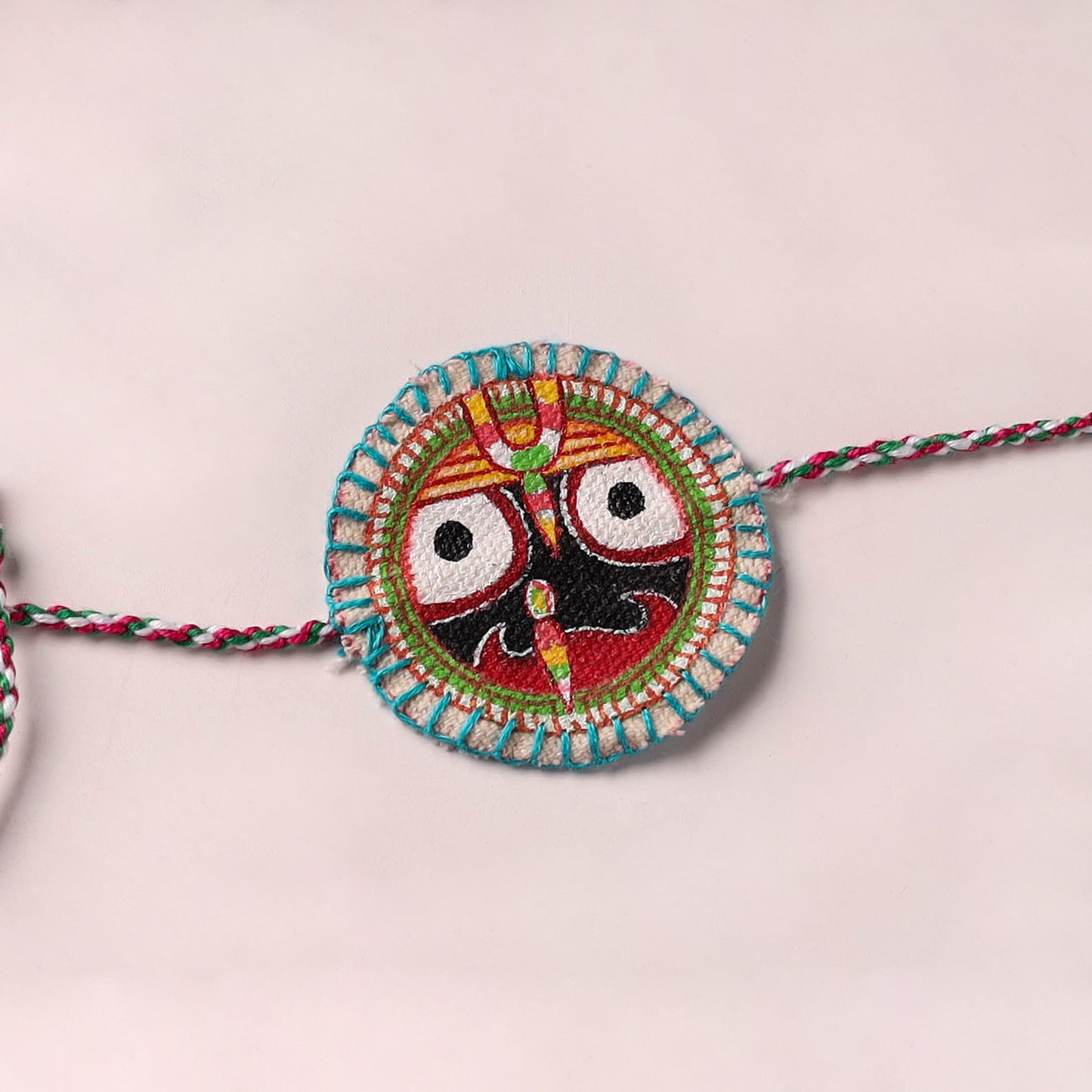 Lord Jagannath - Reusable Pattachitra Handpainted Rakhi with Potli 08