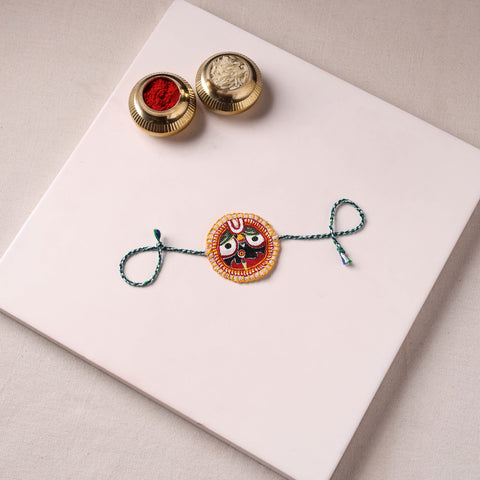 Lord Jagannath - Reusable Pattachitra Handpainted Rakhi with Potli 09