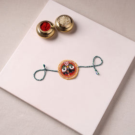Lord Jagannath - Reusable Pattachitra Handpainted Rakhi with Potli 09