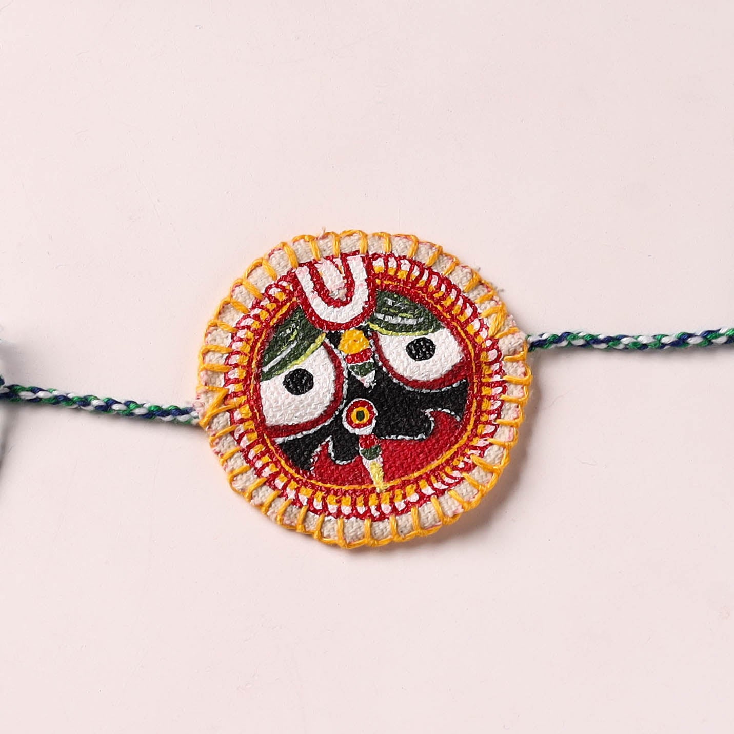 Lord Jagannath - Reusable Pattachitra Handpainted Rakhi with Potli 09