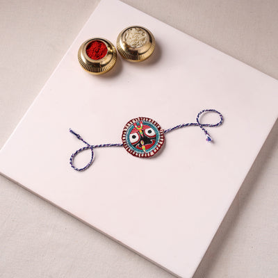 Lord Jagannath - Reusable Pattachitra Handpainted Rakhi with Potli 11