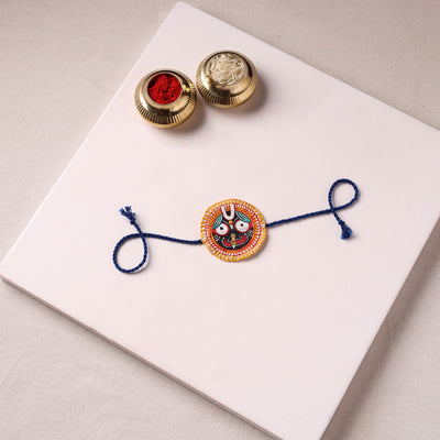 Lord Jagannath - Reusable Pattachitra Handpainted Rakhi with Potli 14