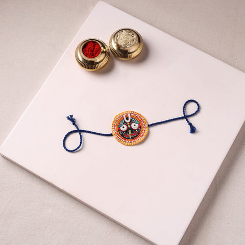 Lord Jagannath - Reusable Pattachitra Handpainted Rakhi with Potli 14