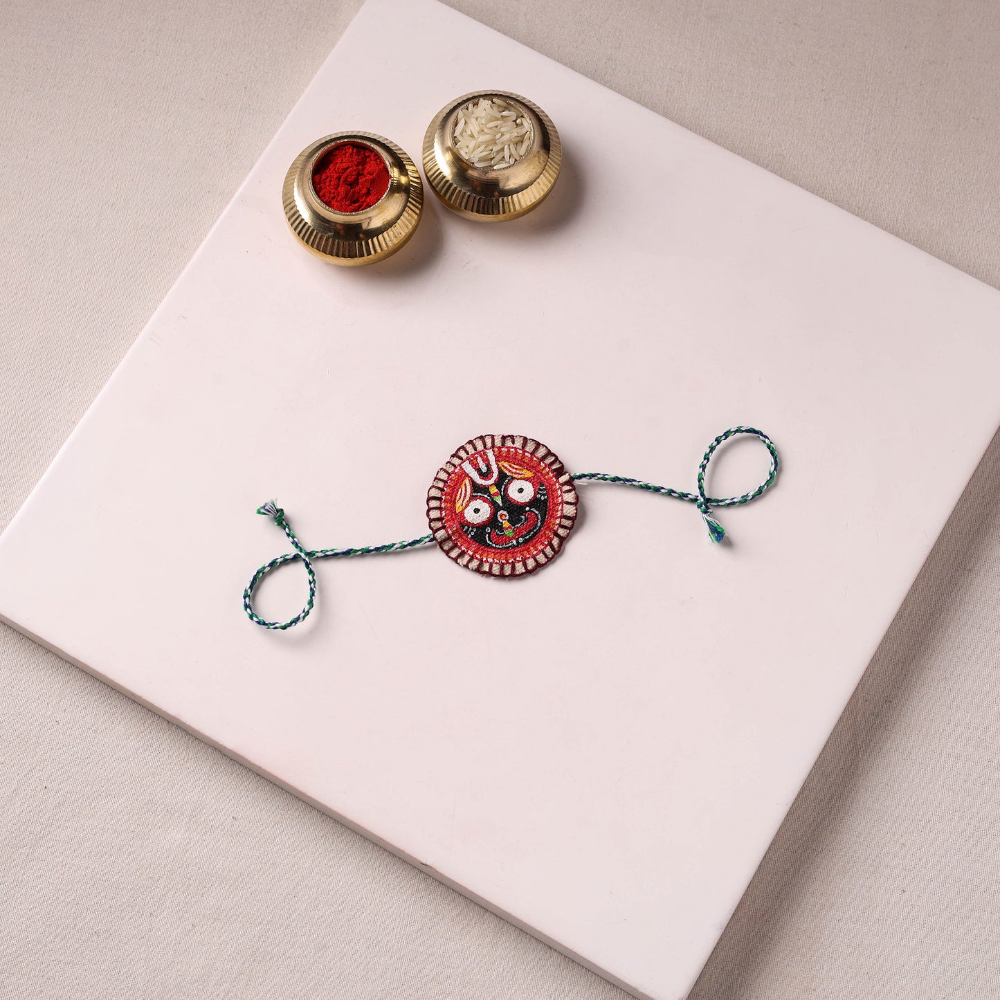 Lord Jagannath - Reusable Pattachitra Handpainted Rakhi with Potli 15