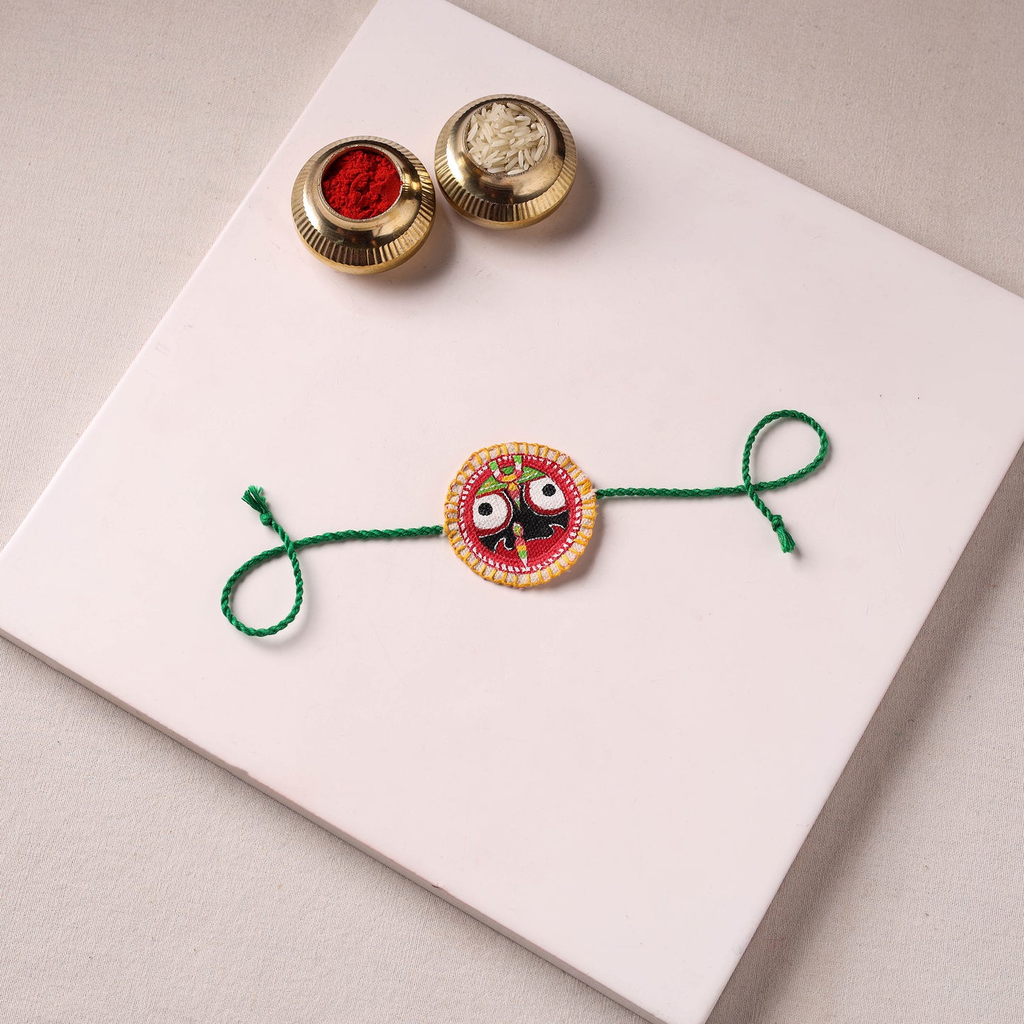 Lord Jagannath - Reusable Pattachitra Handpainted Rakhi with Potli 16