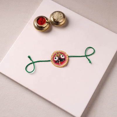 Lord Jagannath - Reusable Pattachitra Handpainted Rakhi with Potli 16