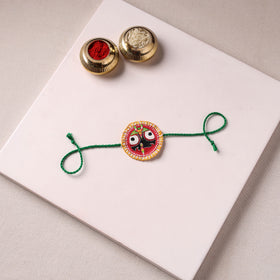 Lord Jagannath - Reusable Pattachitra Handpainted Rakhi with Potli 16