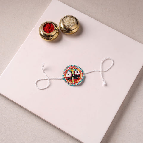 Lord Jagannath - Reusable Pattachitra Handpainted Rakhi with Potli 20