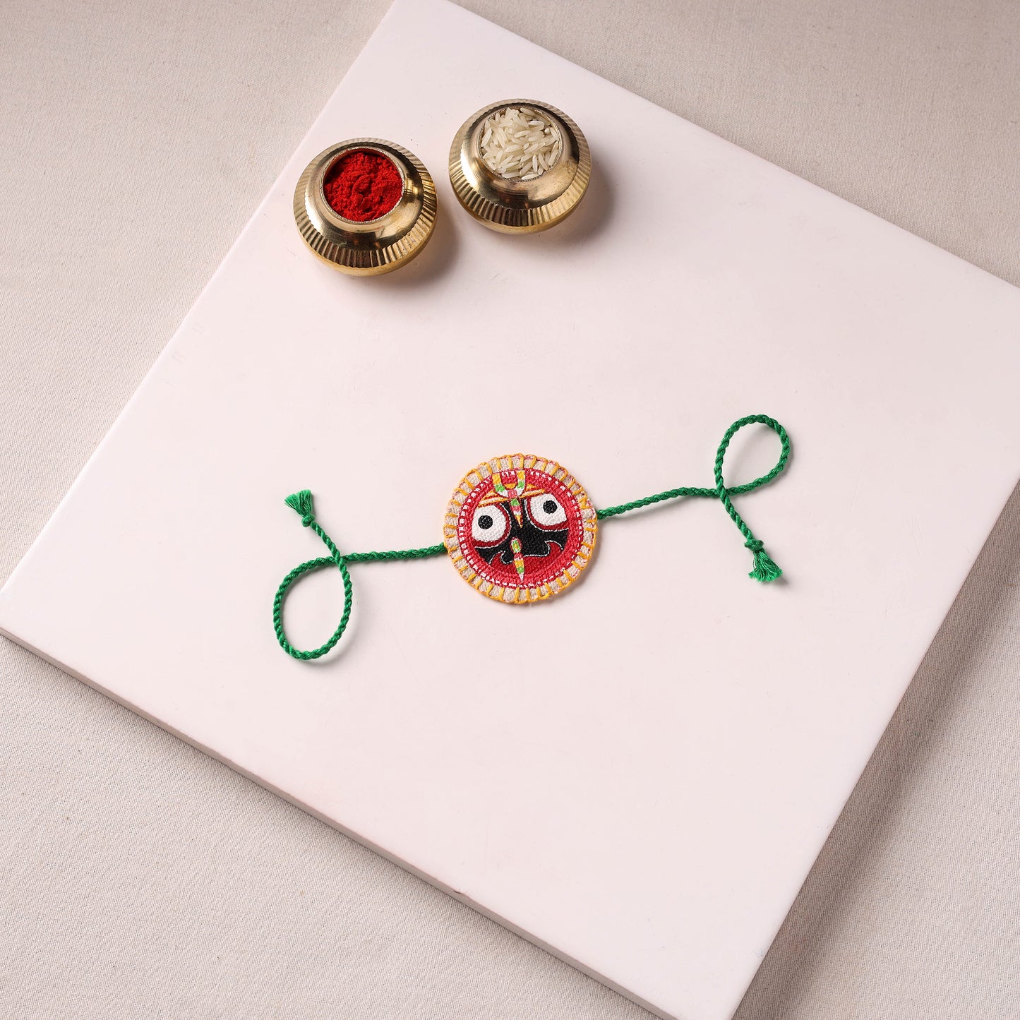 Lord Jagannath - Reusable Pattachitra Handpainted Rakhi with Potli 21