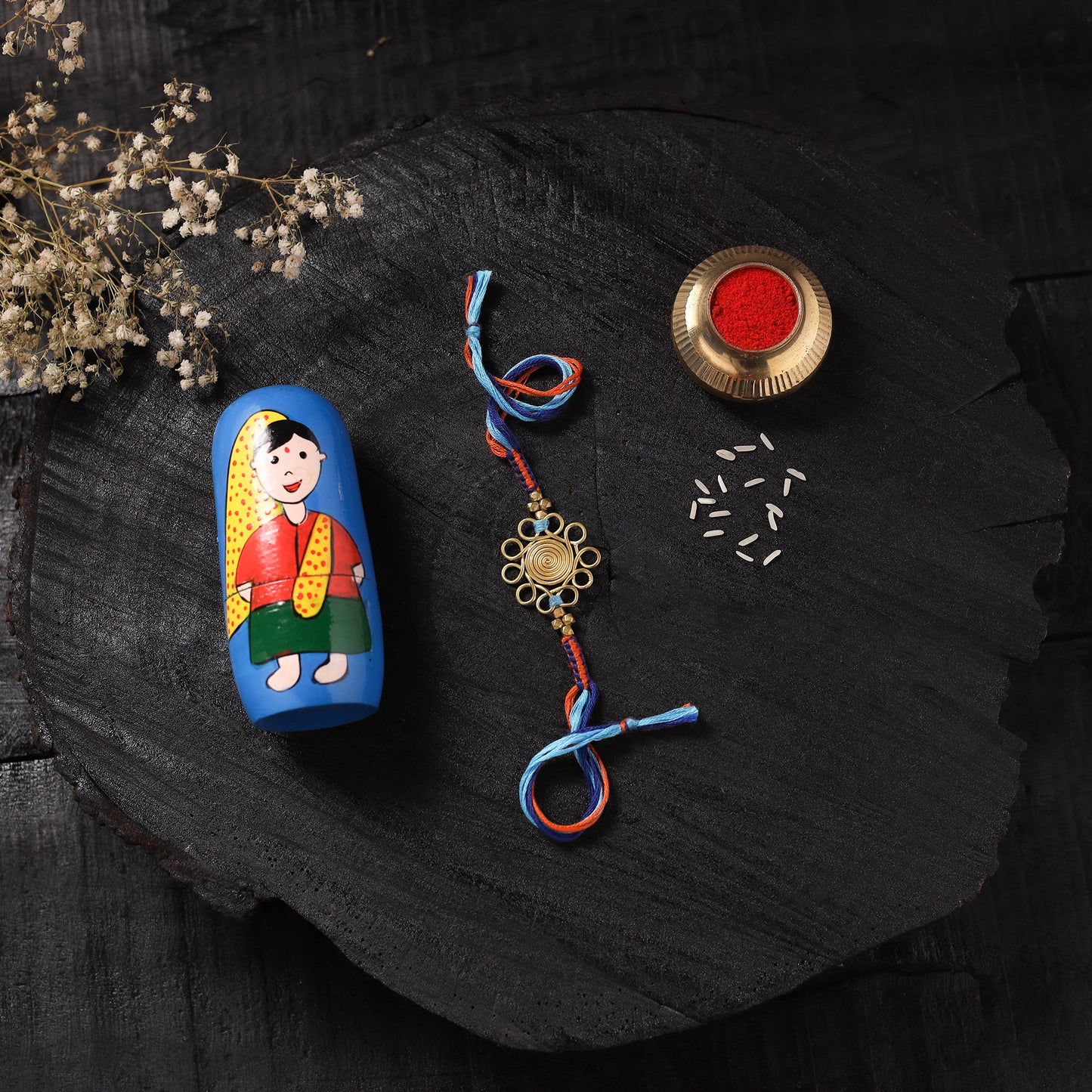 Multicolor - Handcrafted Tribal Dokra Brass Thread Rakhi with Banaras Wood Doll Box 06