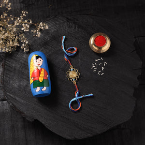 Multicolor - Handcrafted Tribal Dokra Brass Thread Rakhi with Banaras Wood Doll Box 06