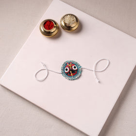 Lord Jagannath - Reusable Pattachitra Handpainted Rakhi with Potli 22