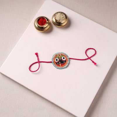 Lord Jagannath - Reusable Pattachitra Handpainted Rakhi with Potli 24