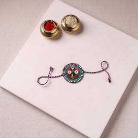 Lord Jagannath - Reusable Pattachitra Handpainted Rakhi with Potli 25