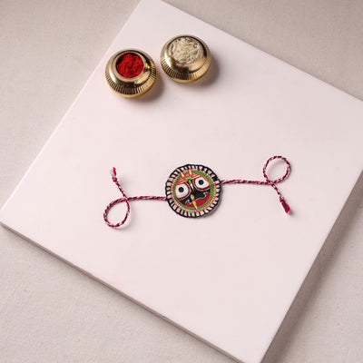 Lord Jagannath - Reusable Pattachitra Handpainted Rakhi with Potli 26
