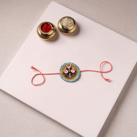 Lord Jagannath - Reusable Pattachitra Handpainted Rakhi with Potli 28