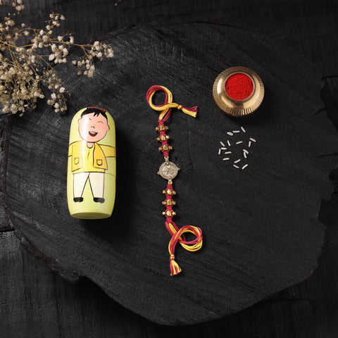 Multicolor - Handcrafted Tribal Dokra Brass Thread Rakhi with Banaras Wood Doll Box 08