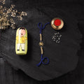 Blue - Handcrafted Tribal Dokra Brass Thread Rakhi with Banaras Wood Doll Box 09