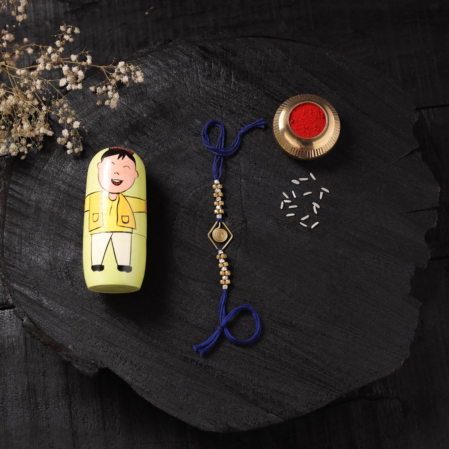 Blue - Handcrafted Tribal Dokra Brass Thread Rakhi with Banaras Wood Doll Box 09