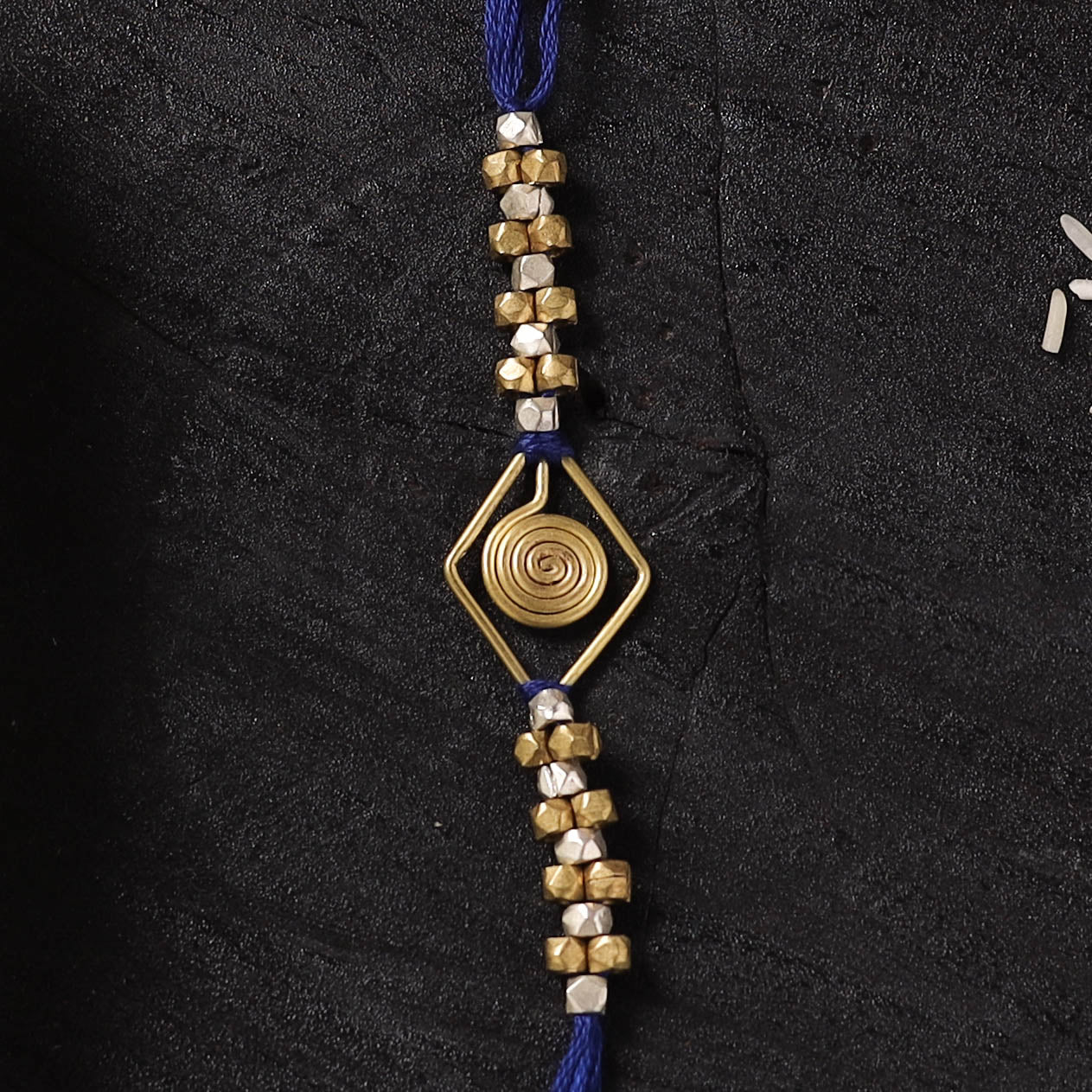 Blue - Handcrafted Tribal Dokra Brass Thread Rakhi with Banaras Wood Doll Box 09
