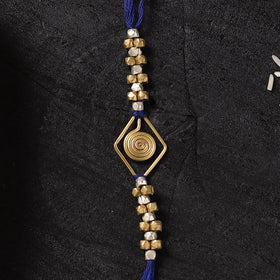 Blue - Handcrafted Tribal Dokra Brass Thread Rakhi with Banaras Wood Doll Box 09