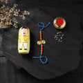 Blue - Handcrafted Tribal Dokra Brass Thread Rakhi with Banaras Wood Doll Box 10