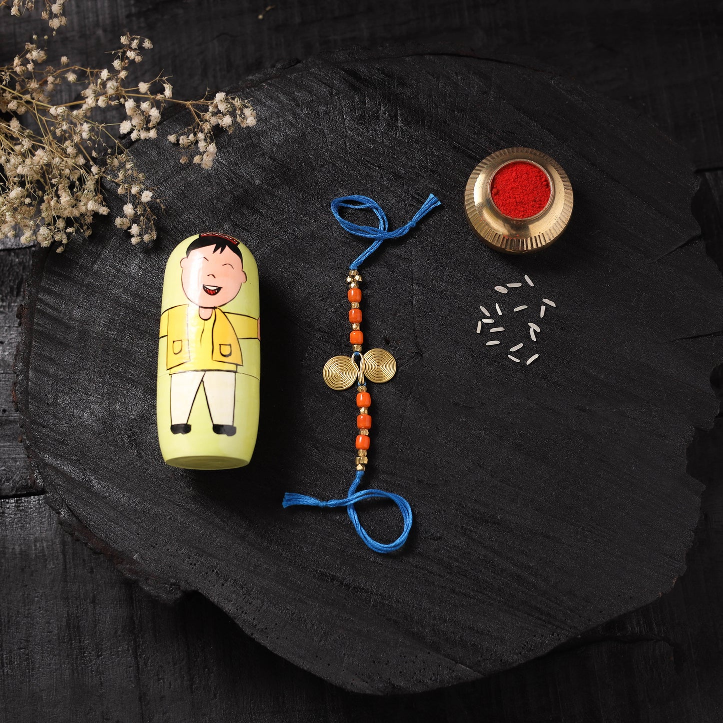Blue - Handcrafted Tribal Dokra Brass Thread Rakhi with Banaras Wood Doll Box 10